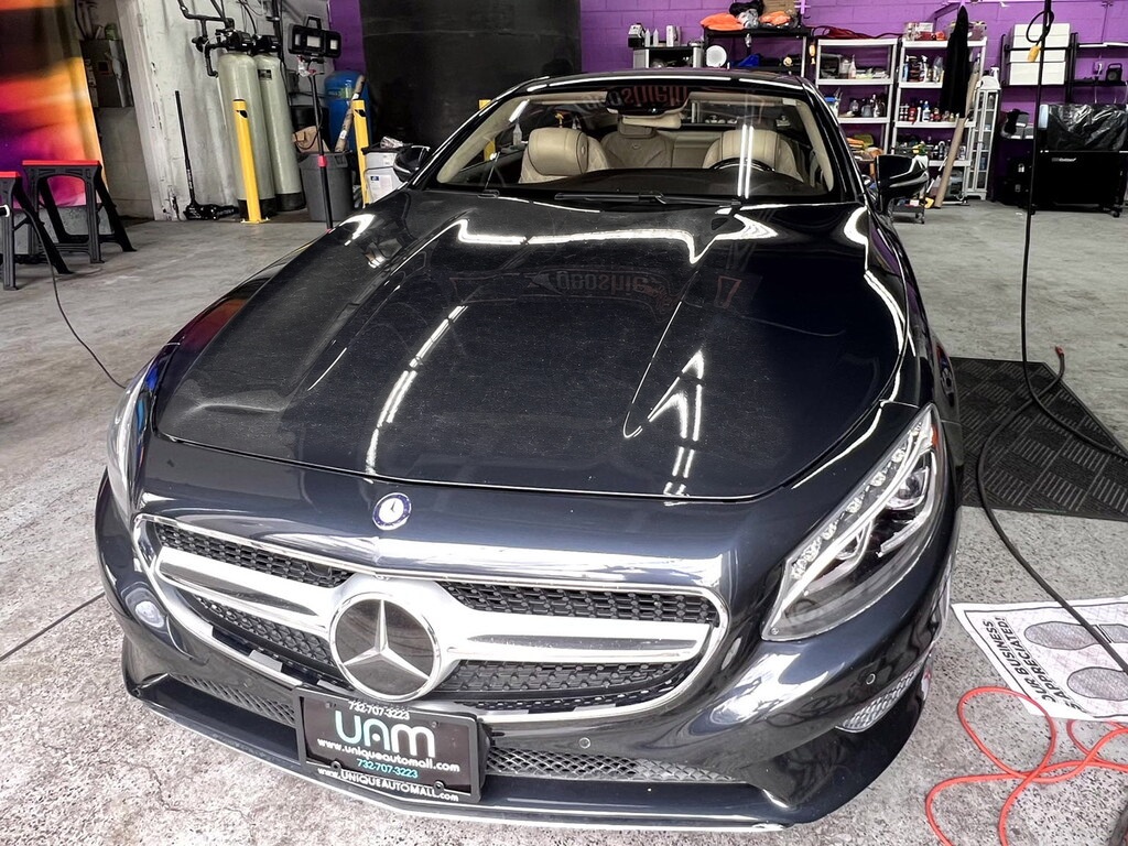 Mercedes S-Class with dusty, swirled hood before paint correction and ceramic coating