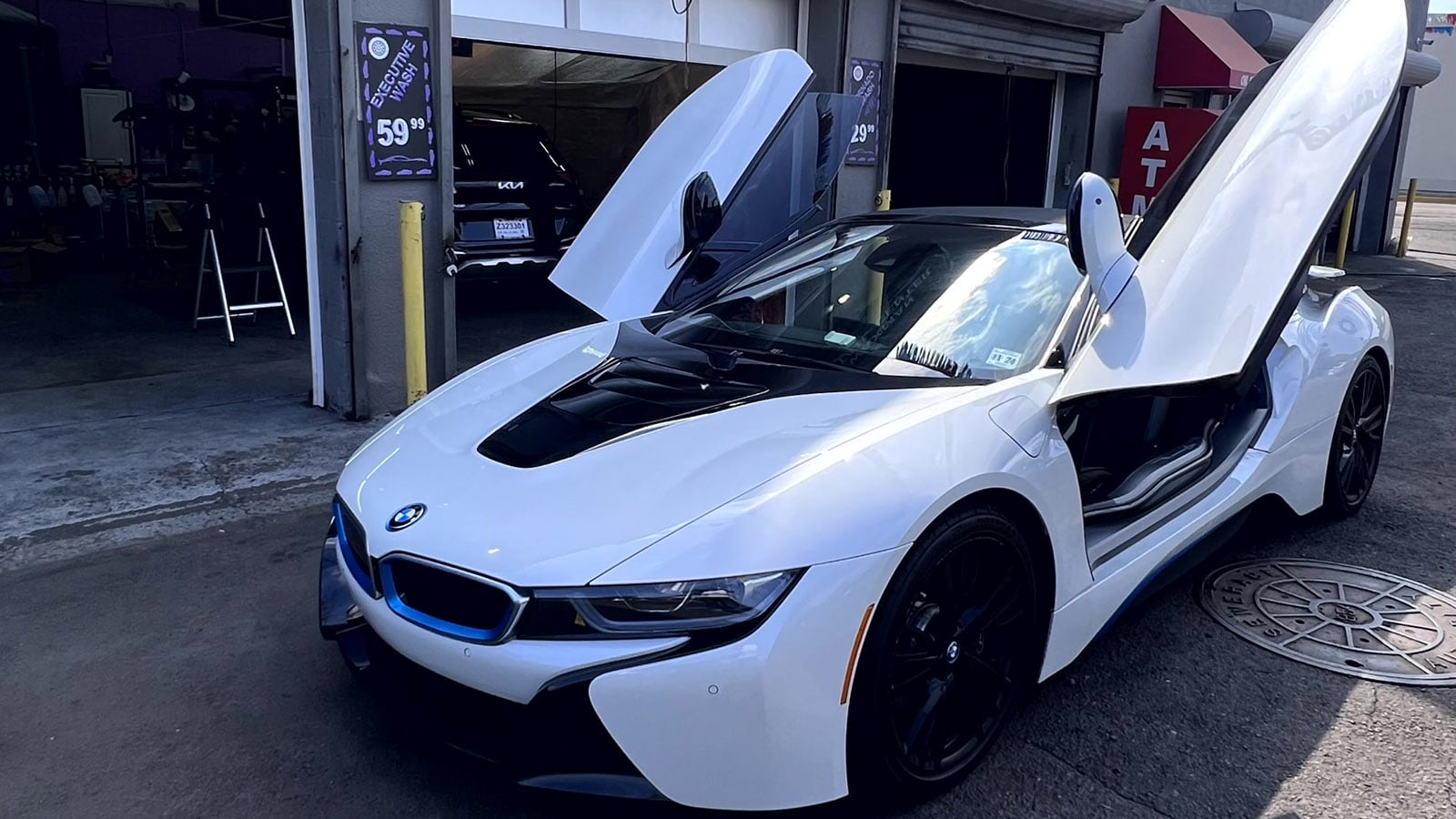 BMW i8 with doors up, detailed and protected at Waxman Collision, Jersey City