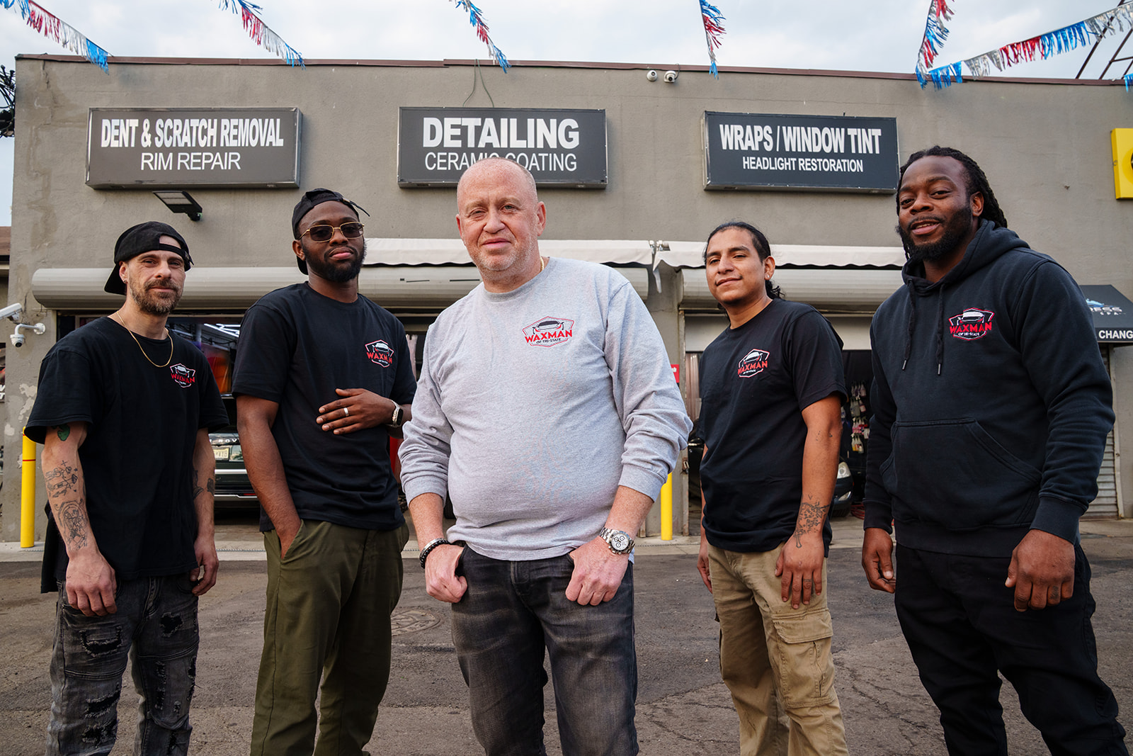 The Waxman family team outside the Jersey City shop